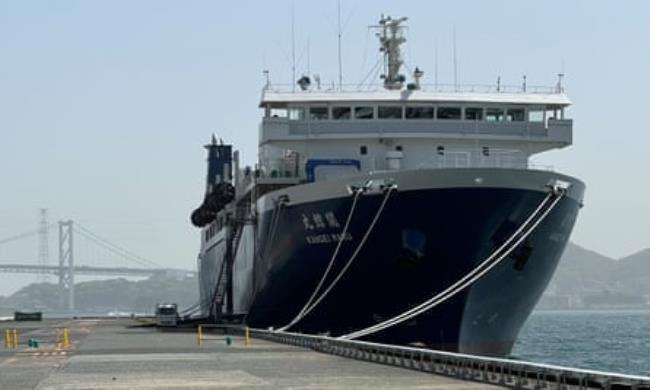 A big ship tied up a quay 
